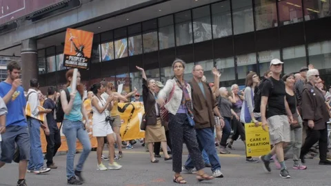 Large group of protestors walking at the People's Climate March in NYC Stock Footage 87787367