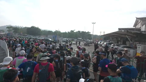 Large group of runners at the start of UTMB running event Stock Footage 303870901