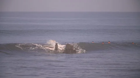 Large group of surfers riding waves Stock-Footage 68907226