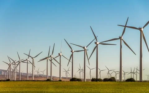 Large group of white wind generators produces alternative energy by wind 스톡 사진