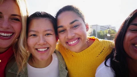 Large group of young smiling multiracial only women taking selfie photo looking Stock Footage 274912662