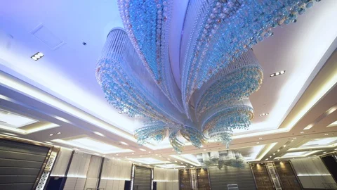 Large hall for performances. Beautiful large crystal chandelier Stock Footage 125536222