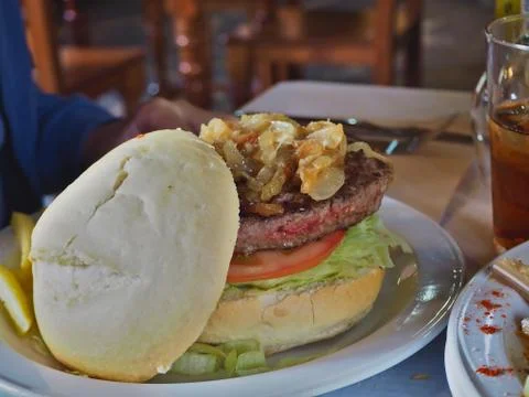 Large hamburger with village bread 写真素材