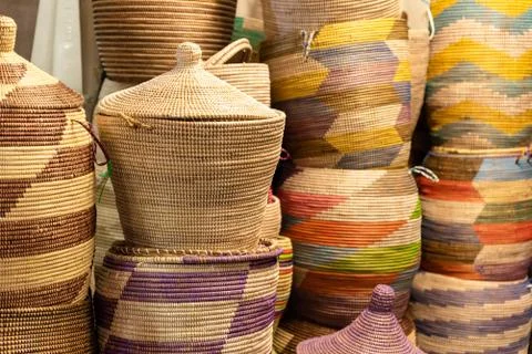Large hand-made colored baskets in an African market Stock Photos