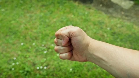 Large Hand Rock Paper Scissors Playing Paper And Winning White Hand Stock Footage 310963998