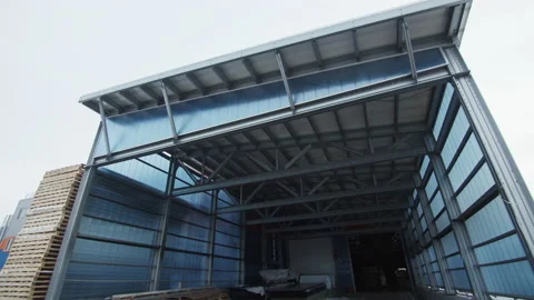 Large hangar with polycarbonate walls for storing products Stock Footage 230038570