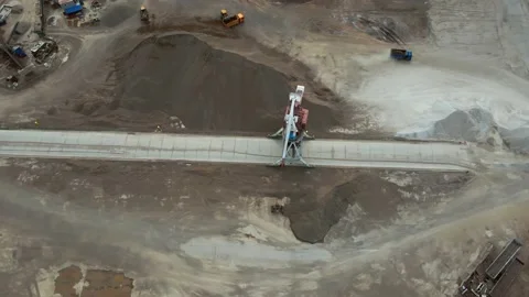 Large harbor cranes on the shore. Operation of the cargo port. Drone Stock Footage 166668926