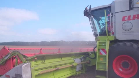 Large harvester harvests Stock Footage 160394088