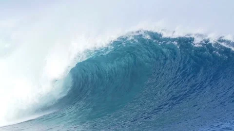 Large heavy Wave Slow Motion breaking onto a shallow reef. Power of the nature Video stock 336585817