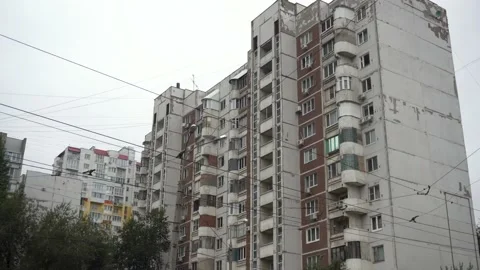 Large high soviet building panoramic view from bottom to top. An old dilapidated Stock Footage 219503362