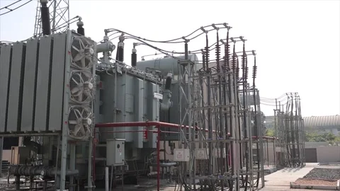 Large High Voltage Power Transformer with Cooling Fans at an Electrical Video stock 334580645