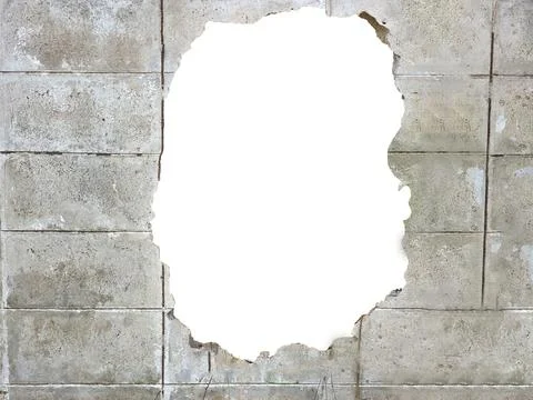 A large hole in an old wall Foto stock