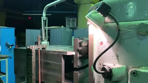 A large horizontal milling machine is at work in the factory. Stock Footage