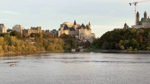 A large hotel building on the river Stock Footage 164121704