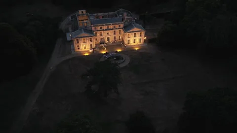 A large house with a large tree in front of it Stock Footage 301628550