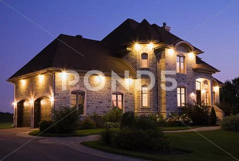 Large house with lights Stock Photos