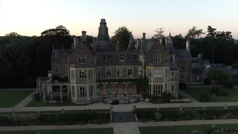 A large house with a lot of windows and a large front porch Stock Footage 301628150