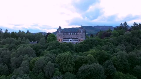 A large house is in the middle of a forest Stock Footage 306624466