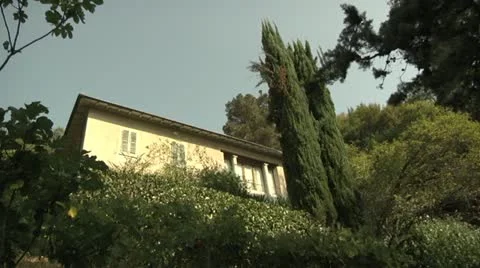 Large House Through Trees in Carona, Switzerland Stock Footage 11880948