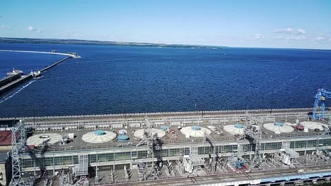 A large Hydroelectric Complex And Power Plant Crossing A Wide River. Video stock 318071388