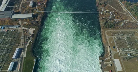 Large Hydropower System. Hydroelectric Dam on the River, Water Discharge From Stock Footage 329611299