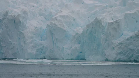 Large Ice Wall From A Glacier At Paradise Harbor In Antarctica. Close-up Shot Vídeo Stock 334082116