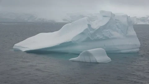 Large iceberg drifting southern ocean Antarctica, 4K Stock Footage 332371548