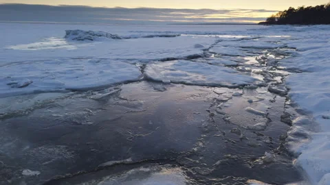 Large icy snow white layers of glacier, cracked by their spring warming and Stock Footage 309019876