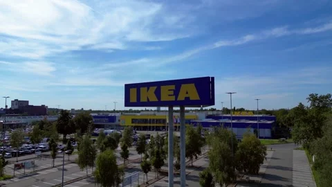 Large IKEA Sign and store exterior with parking lot. Beautiful aerial view Vidéo 317675200