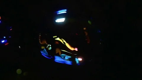 Large, illuminated bubble balls floating in black background Stock Footage 79616678