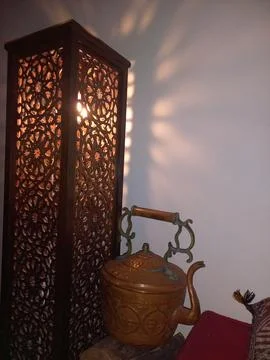 A large, illuminated lantern made of arabesque Stock Photos