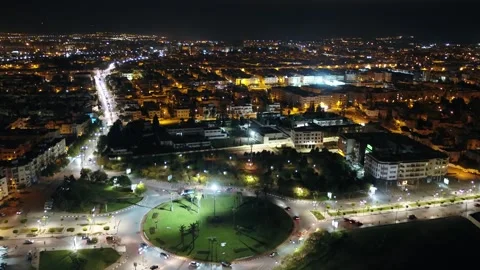 Large Illuminated Roundabout and Night Traffic in Fez, Morocco Stock Footage 343939476