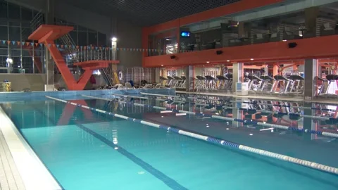 Large indoor pool. empty pool, without people, many swimming paths. overall plan Stock Footage 134729078