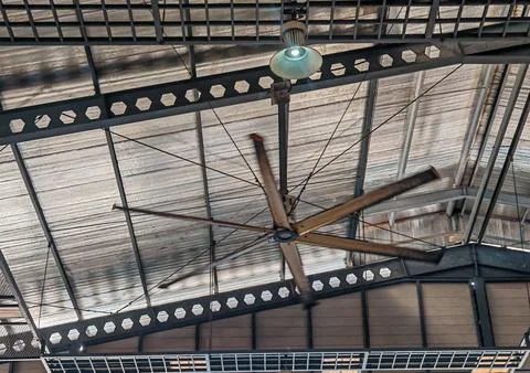 Large Industrial Ceiling Fan Inside Modern Warehouse Roof Structure Stock Photos