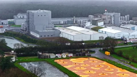 Large Industrial Complex Beside Rural Fields Aerial Pullback Video stock 333325837