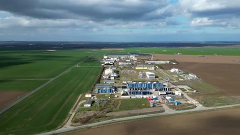 Large Industrial Complex Surrounded by Farmland – 4K Aerial Drone Stock Footage 341849757