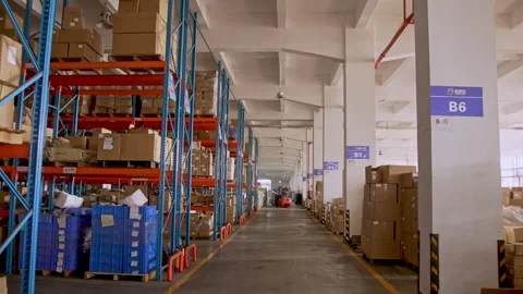 Large Industrial Logistics Warehouse Interior with Rows of Shelves and Boxes Stock Footage 337090750