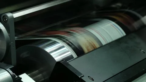 Large industrial offset printing machine prints image on packaging film. tech Stock Footage 344390708