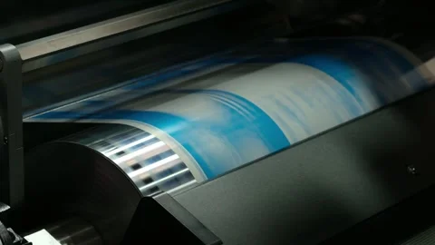 Large industrial offset printing machine prints image on packaging film. tech Stock Footage 344390743
