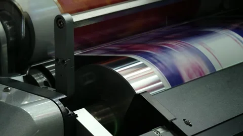 Large industrial offset printing machine prints image on packaging film. tech Stock Footage 344390752