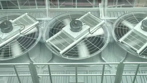 Large Industrial Ventilation Fans Operating in Modern Building Stockbeeldmateriaal 342251296