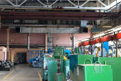 A large industrial workshop inside the building with machine tools and a ware Stock Photos