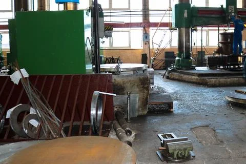 A large industrial workshop inside the building with machine tools and a ware Stock Photos