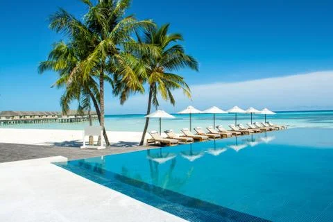 Large infinity pool on the shores of the Indian Ocean Stock Photos