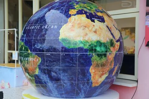 A large inflatable globe with the distinctive shape of the atlantic ocean o.. Stock Photos