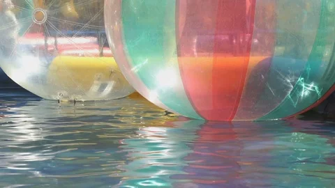 Large inflatable transparent water balls outdoors Stock Footage 71662289