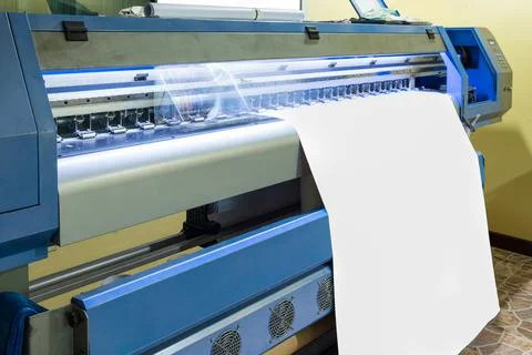 Large inkjet printer head working on white blank vinyl Stock Photos