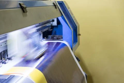 Large inkjet printer head working on vinyl banner Stock Photos
