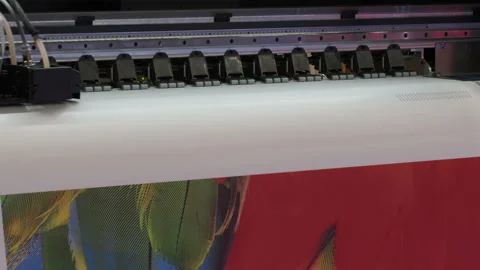 Large Inkjet printer working, industrial printer, plotter head slides over th Stock Footage 257350258