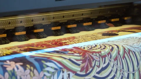 Large Inkjet printer working, industrial printer, plotter head slides over th Stock Footage 257351147